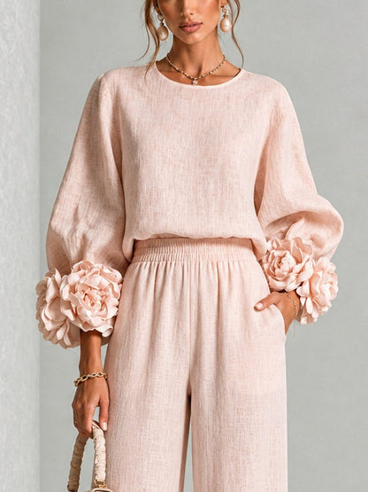 Completo Donna Rosa con Top a Girocollo e Pantaloni a Gamba Larga con Polsini Floreali